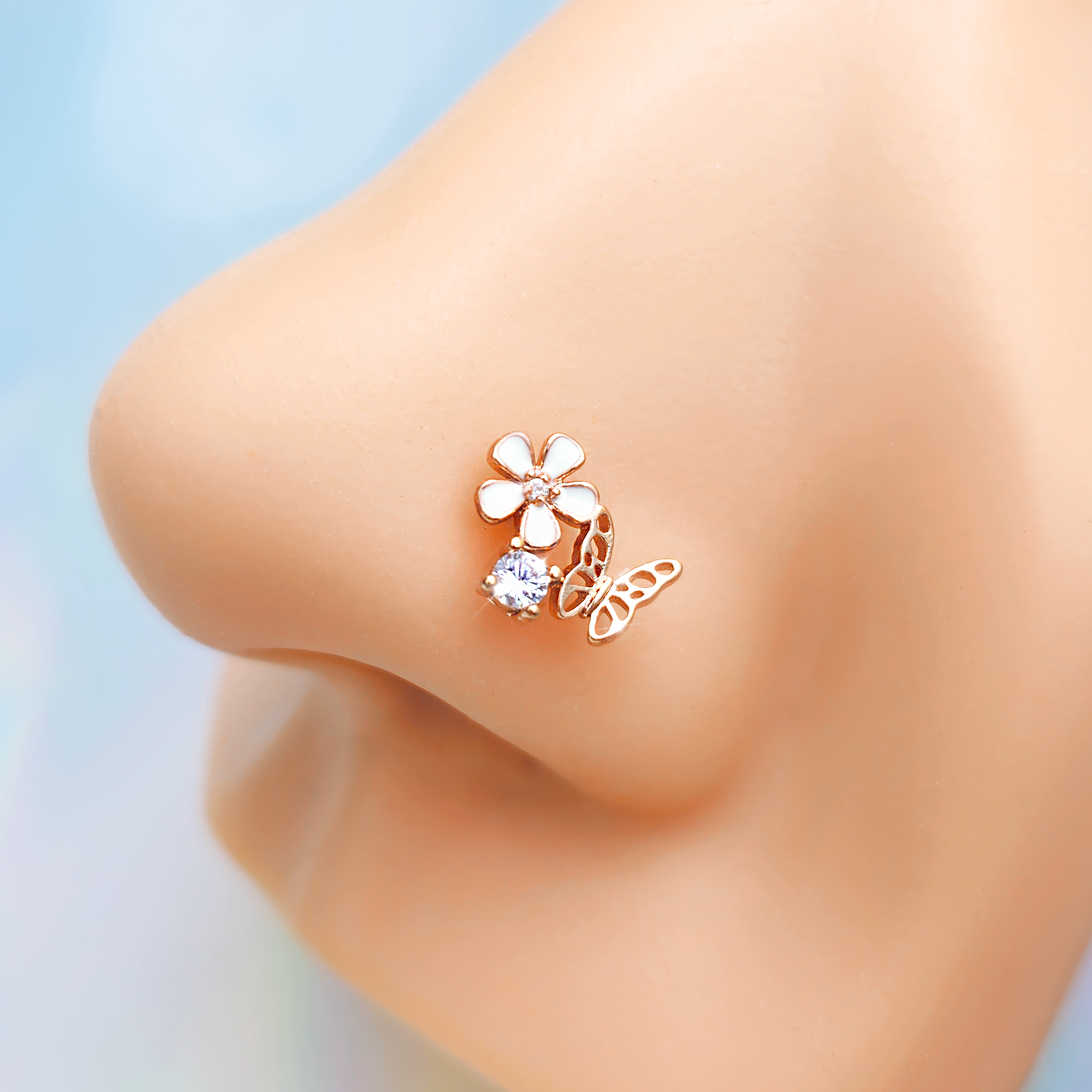 20 Gauge 1/4 Clear CZ Gem Rose Gold Tone Butterfly Flower Nose Bone