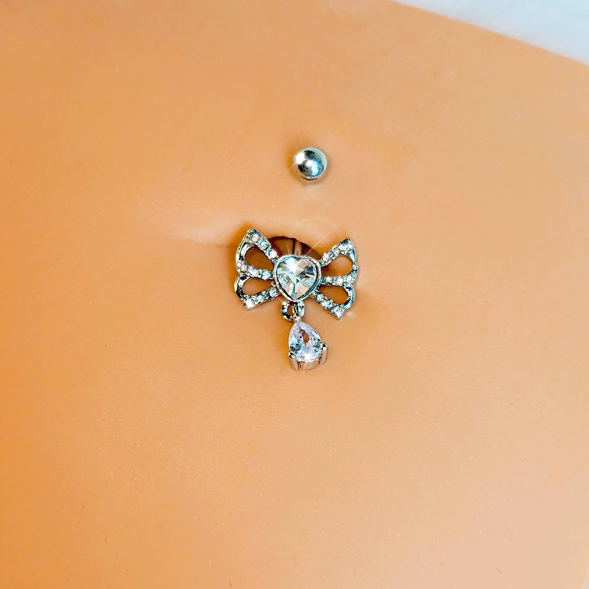 Clear CZ Gem Heart In A Bow Dangle Belly Ring