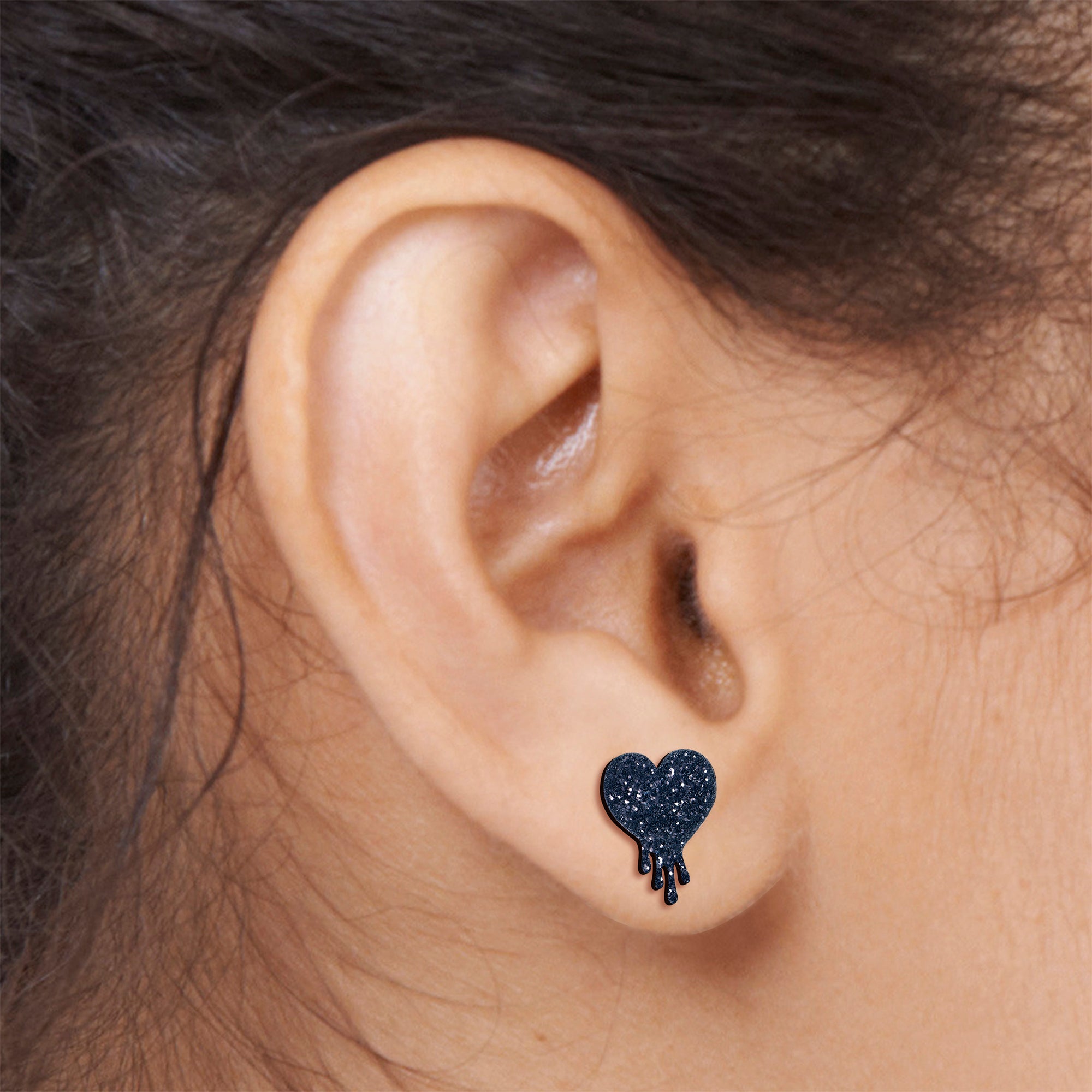 Melting heart stud earrings