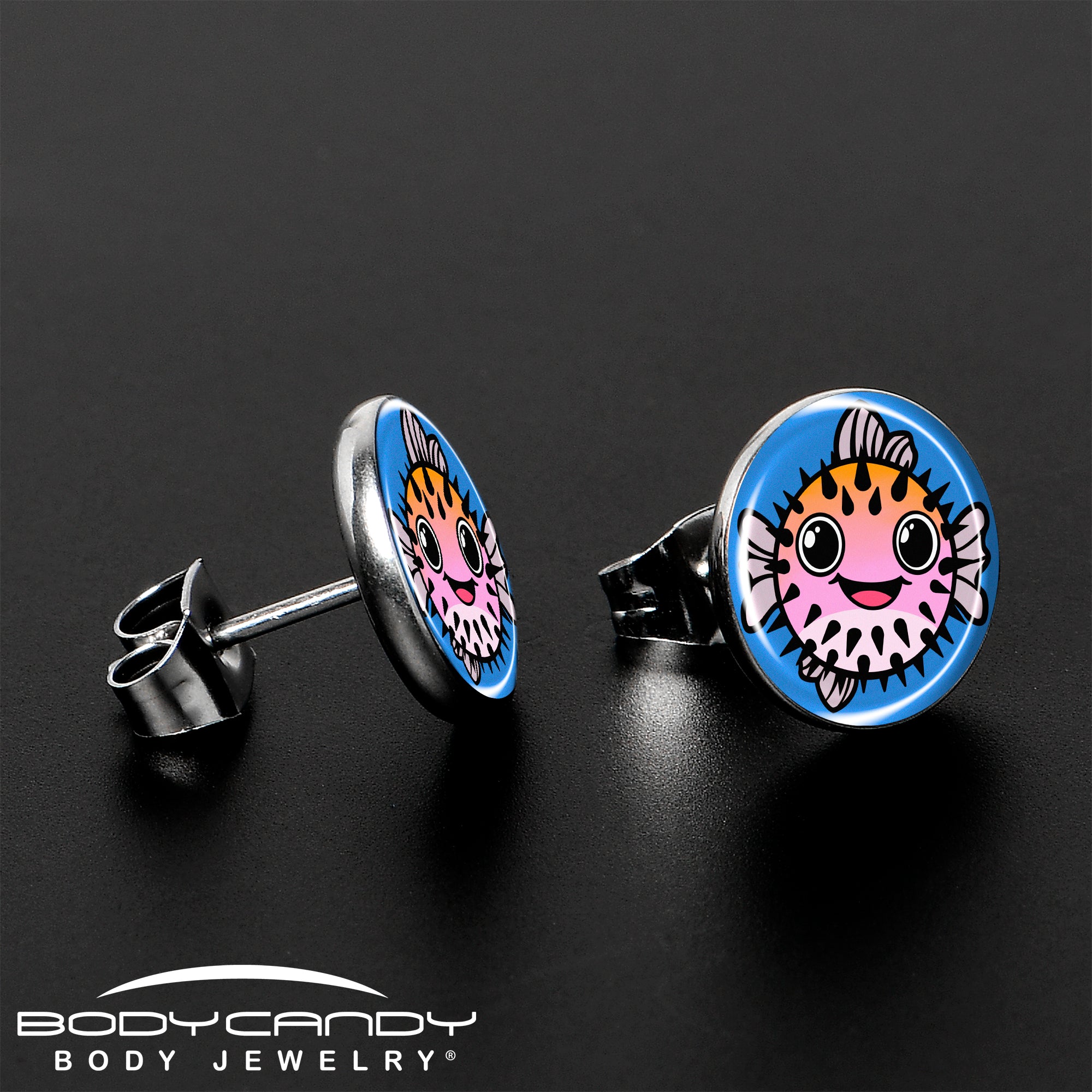 Cute pink pufferfish stud earrings in motion