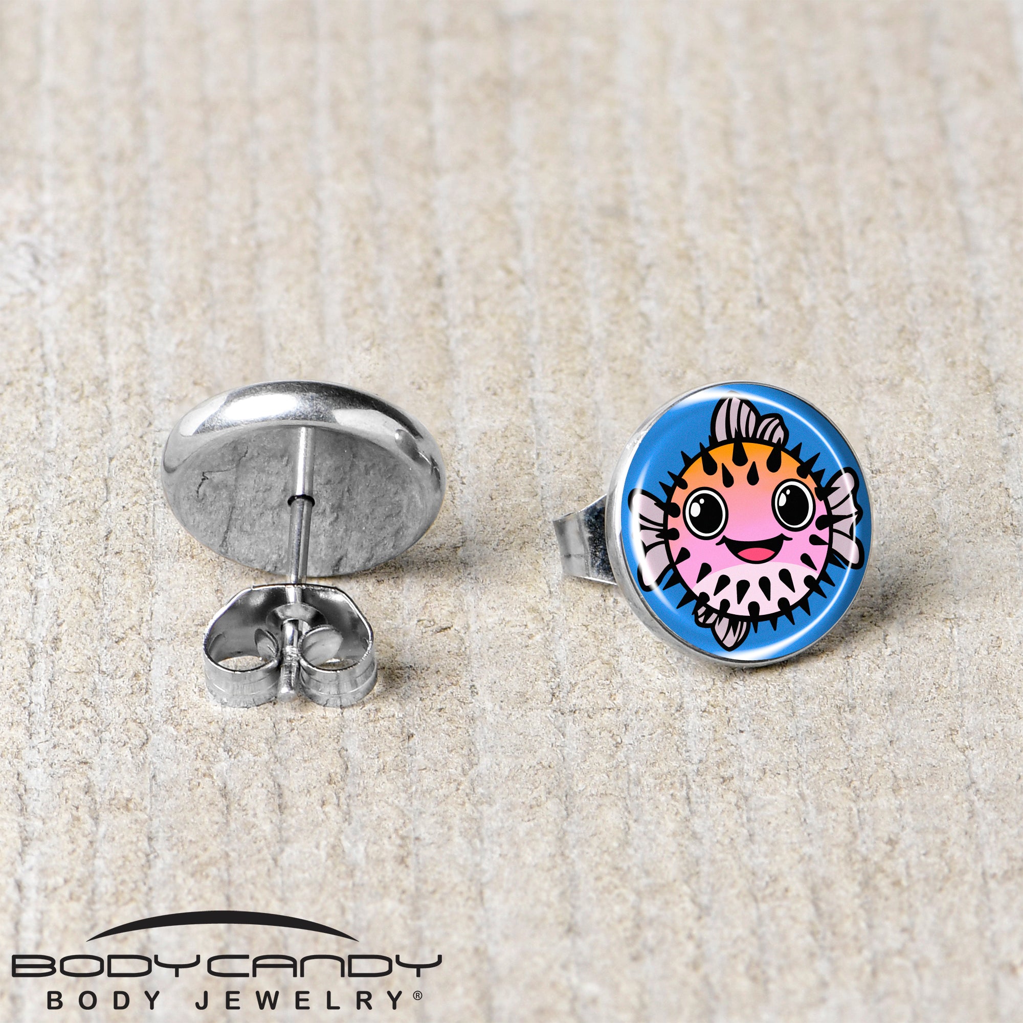 Bright pink pufferfish stud earrings swimming