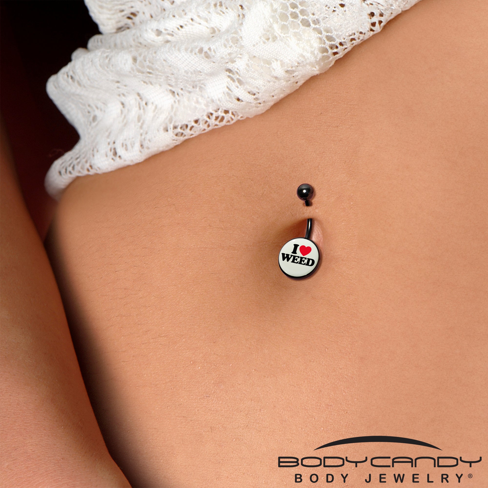 Unique black anodized glow-in-the-dark belly ring with cannabis-themed design