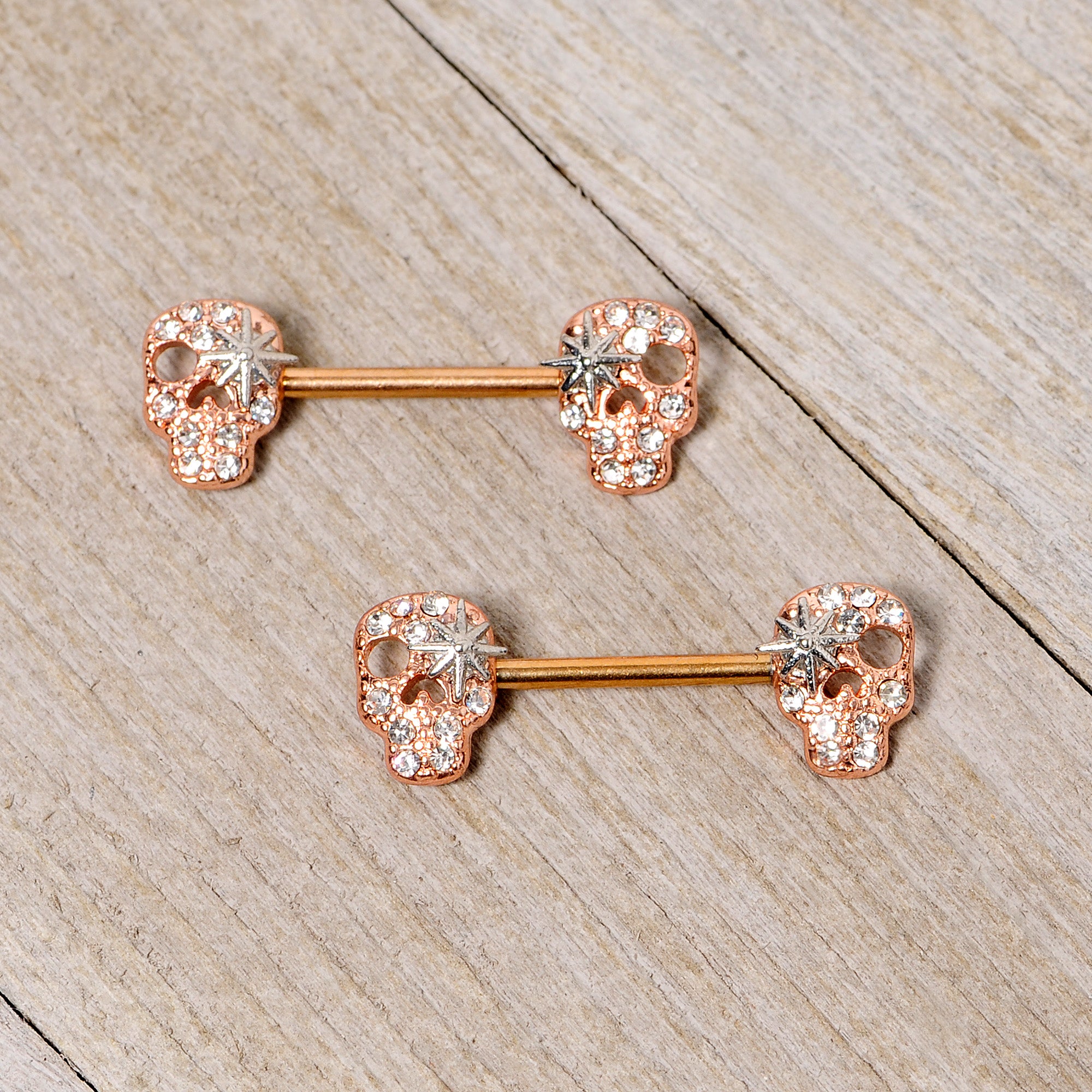 14 Gauge Clear Gem Rose Gold Tone Star Skull Barbell Nipple Ring Set