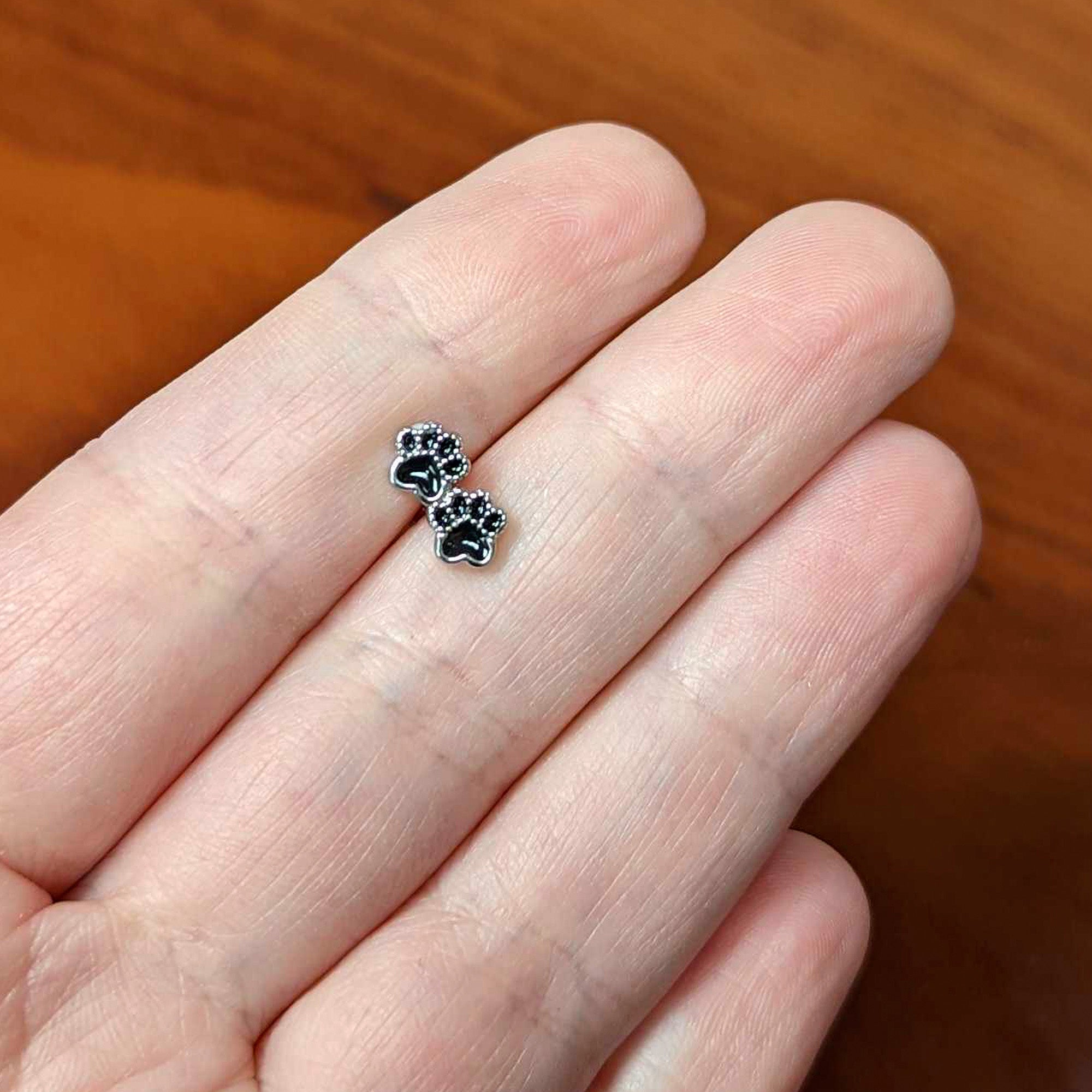 16 Gauge 1/4 Textured Black Paw Prints Cartilage Tragus Earring