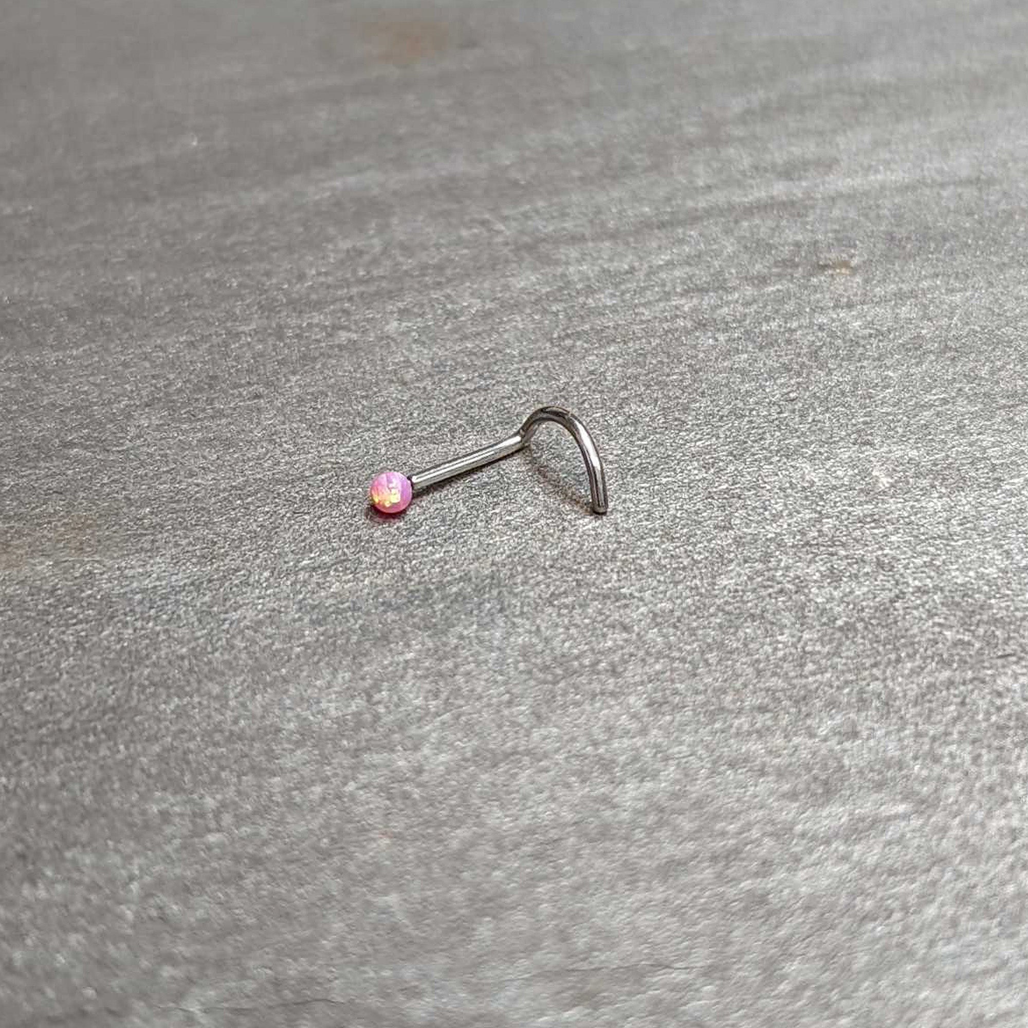 20 Gauge 1/4 Pink Synth Opal G23 Titanium Threadless Left Nose Screw