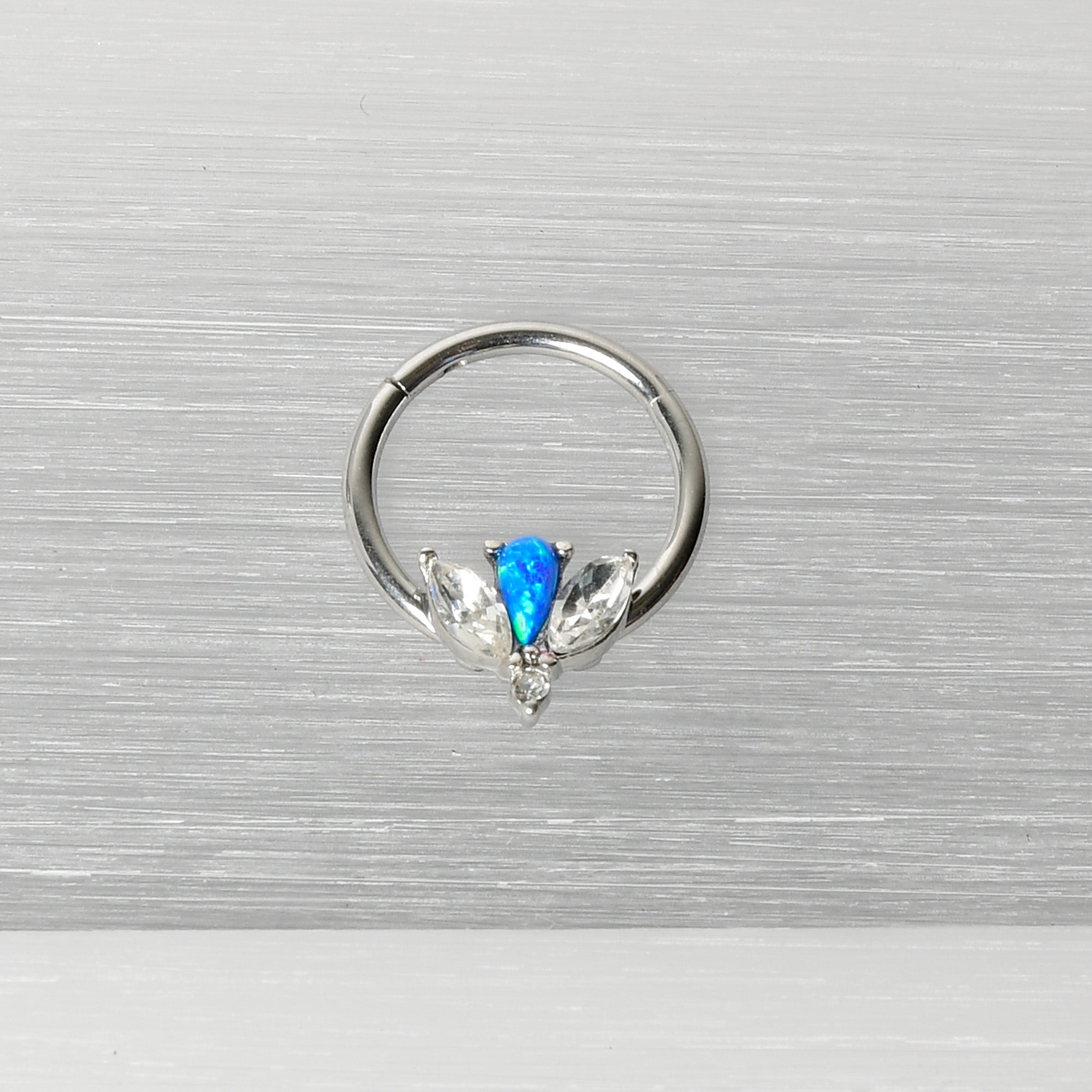 16 Gauge 3/8 Blue Faux Opal Style Flower Hinged Segment Ring