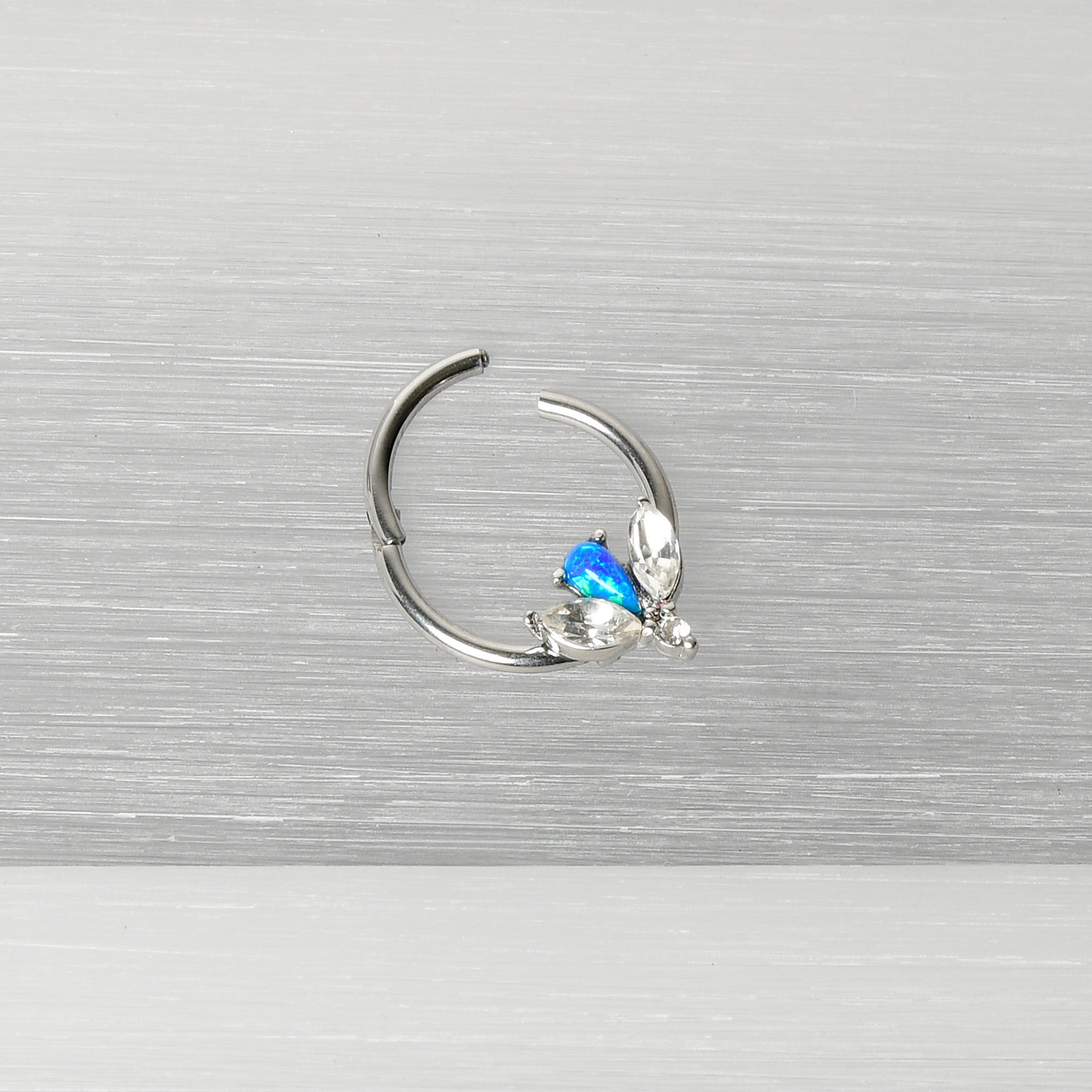 16 Gauge 3/8 Blue Faux Opal Style Flower Hinged Segment Ring