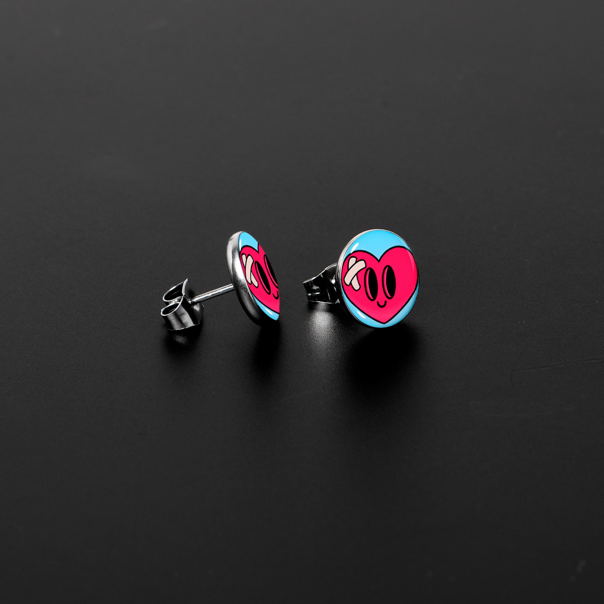 Heartbreak Bandaged Heart Stud Earrings