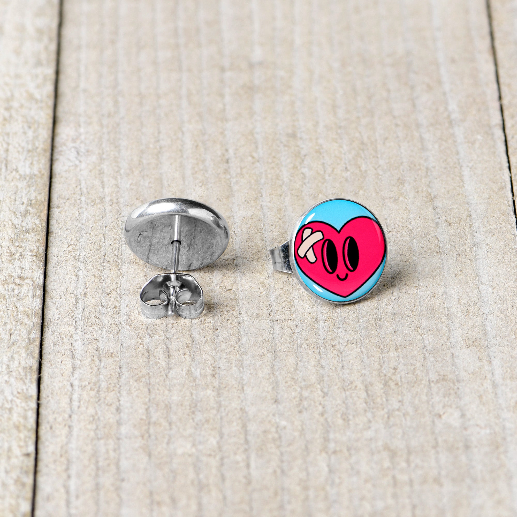 Heartbreak Bandaged Heart Stud Earrings