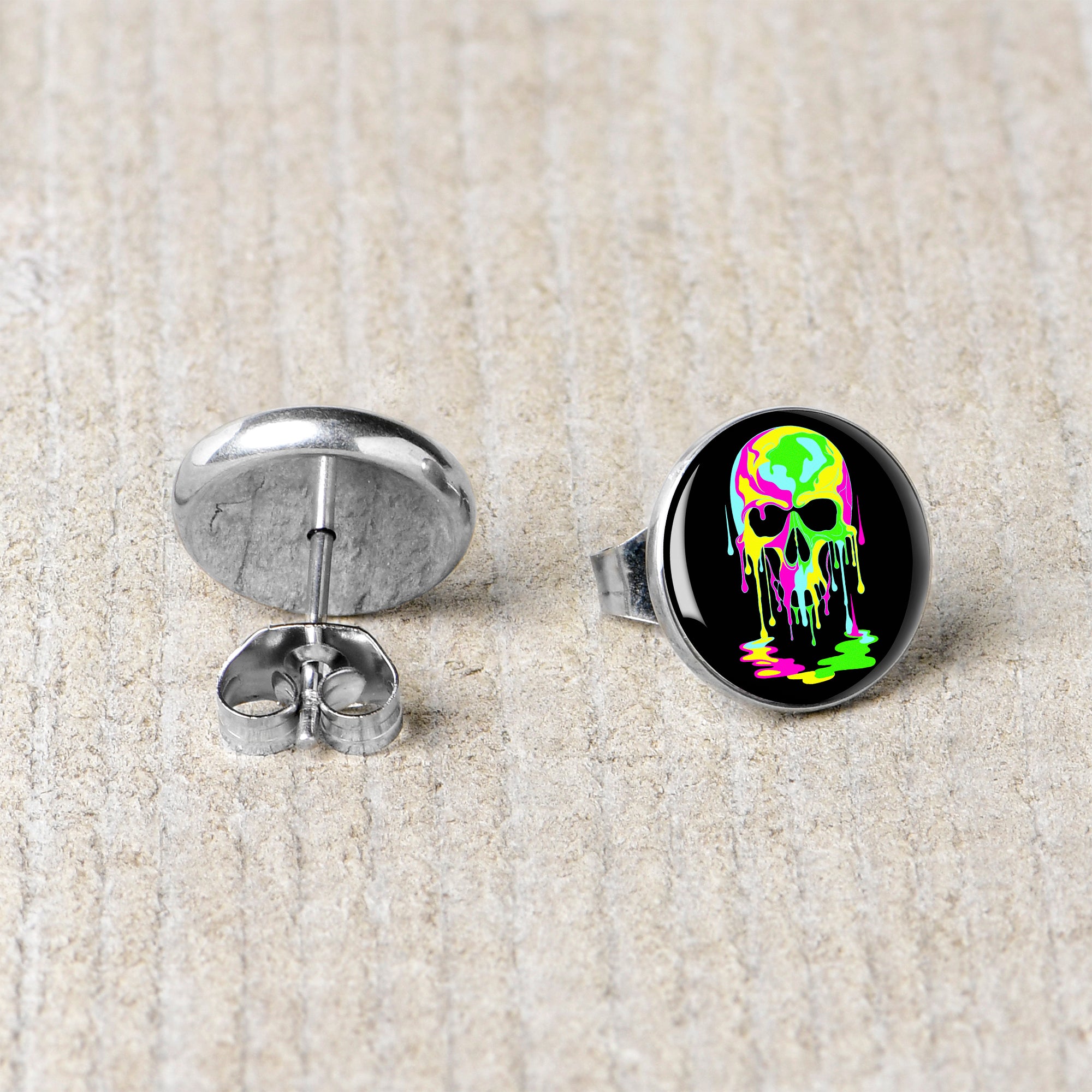 Ultra Bright Melting Skull Stud Earrings